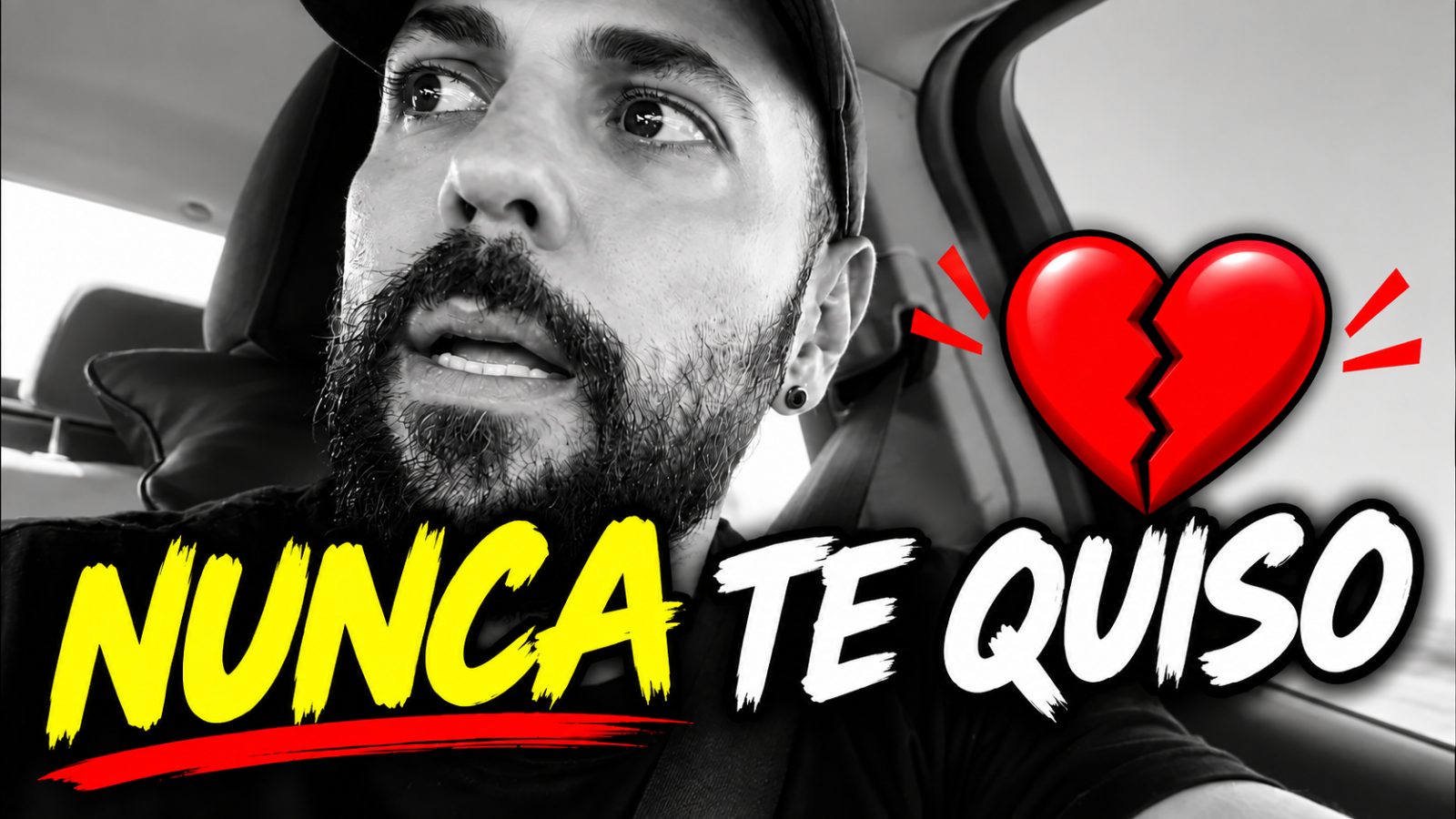 Rony Begood en el coche con el texto «Nunca te quiso» y un corazón roto